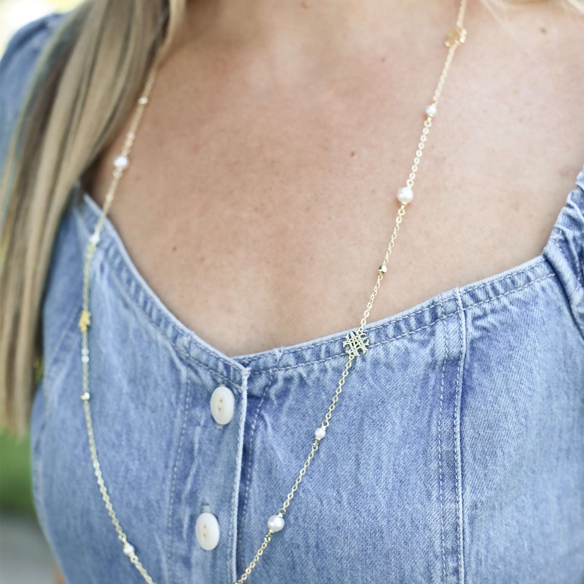 Adorned Pearl Logo Station Necklaces