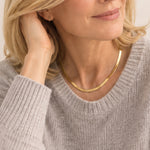 Gold Snake Chain Necklace styled with everyday jewelry