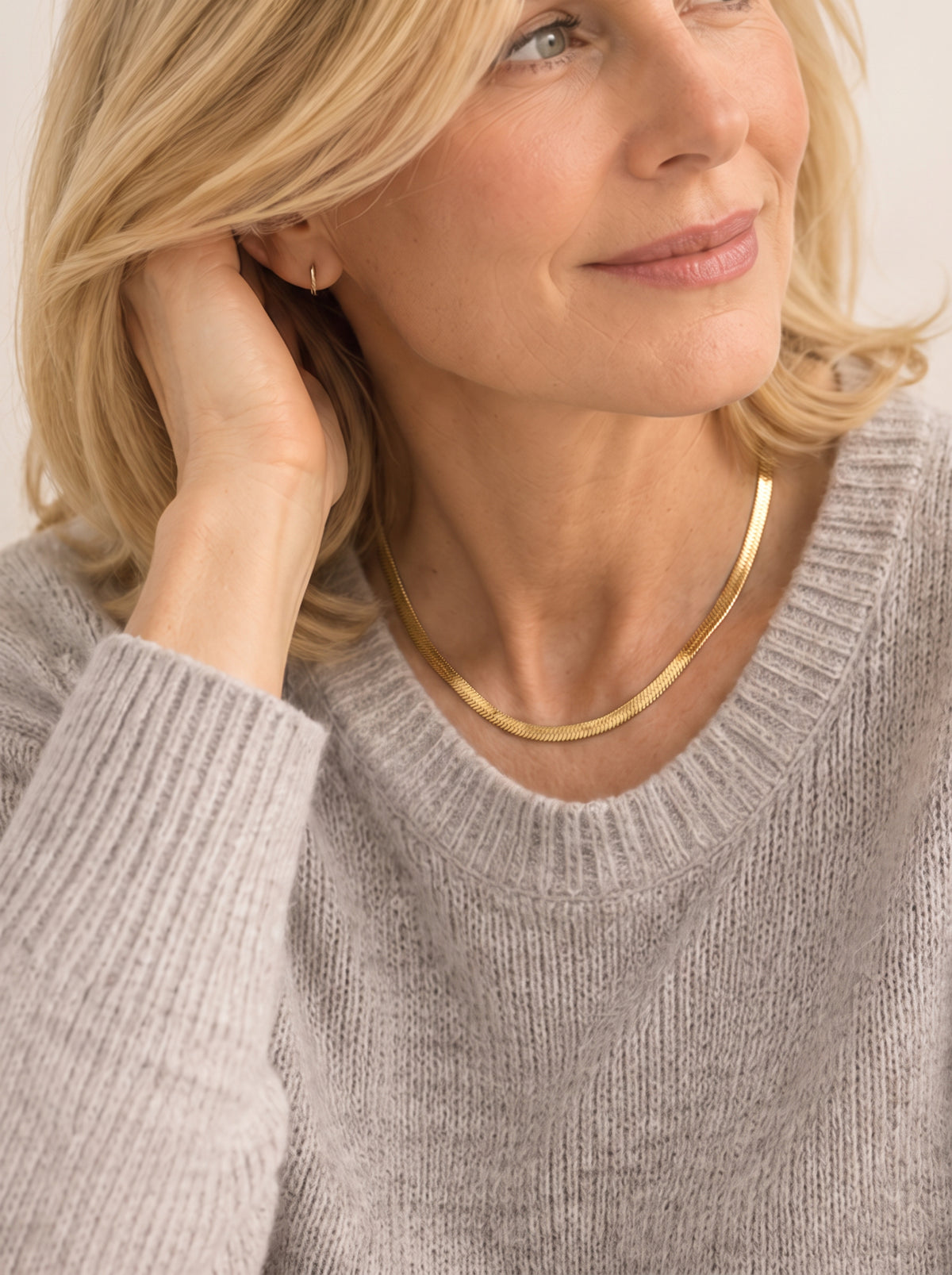Gold Snake Chain Necklace styled with everyday jewelry