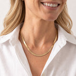 Woman wearing the Gold Snake Chain Necklace by Natalie Wood Designs