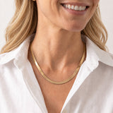 Woman wearing the Gold Snake Chain Necklace by Natalie Wood Designs